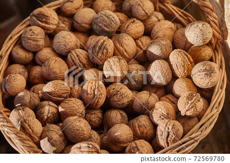Walnuts in a pile Walnuts in a pile 72569780