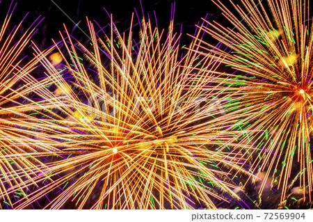 Chic colorful firework with multicolored glowing spheres, flickering stars. Bright holiday background Chic colorful firework with multicolored glowing spheres, flickering stars. Bright holiday background 72569904