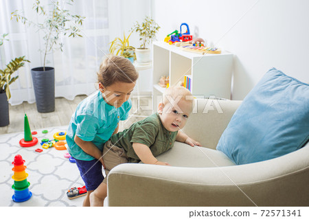 Brothers support in everyday situations is priceless Brothers support in everyday situations is priceless 72571341