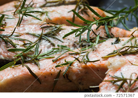Baked in the oven salmon with rosemary Baked in the oven salmon with rosemary 72571367