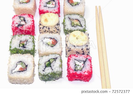 four pieces of sushi on a white background. the view from the top 72572377