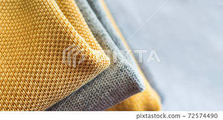 Yellow illuminated color and gray winter sweaters 72574490