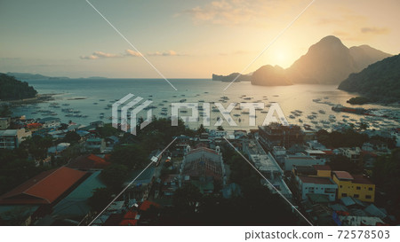 Ocean bay port with water transport at tropical cityscape. Paradise resort, Philippines islands Ocean bay port with water transport at tropical cityscape. Paradise resort, Philippines islands 72578503