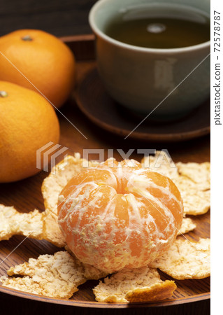 Hot tea and oranges Hot tea and oranges 72578787