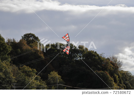 Sport kite flying in the sky Sport kite flying in the sky 72580672