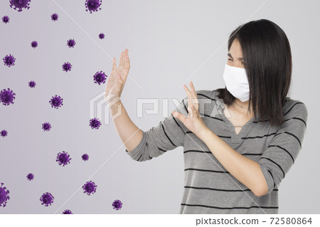 woman feel scared virus and bacteria. 72580864