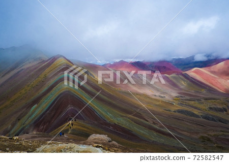 Rainbow Mountain (Mt. Binikunka) Alpine plants and animals suddenly appear in the unexplored Andes Mountains of Peru, South America 72582547