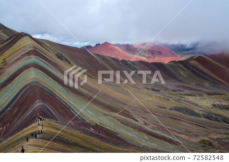 Rainbow Mountain (Mt. Binikunka) Alpine plants and animals suddenly appear in the unexplored Andes Mountains of Peru, South America 72582548