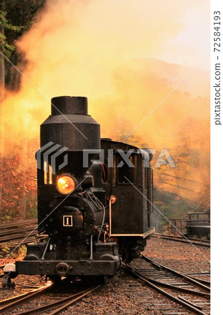 Akazawa Forest Railway (Kiso Forest Railway) Baldwin steam locomotive stands in the dusk 72584193