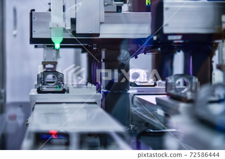 Manufacturing process of camera parts in industrial plants on conveyor belts in factories 72586444