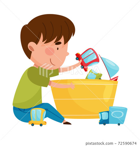 Happy Boy Sitting on Floor and Playing with Different Toys in Playroom Vector Illustration 72590674