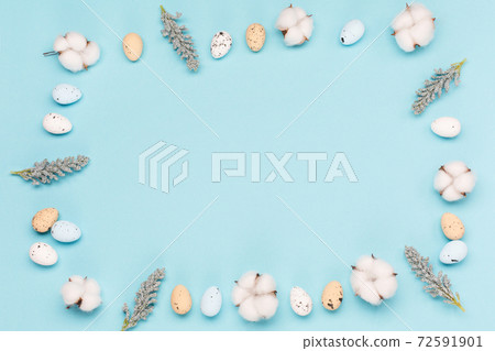 Craft Easter eggs on blue pastel background, space for text. Flat lay image composition, top view. Craft Easter eggs on blue pastel background, space for text. Flat lay image composition, top view. 72591901