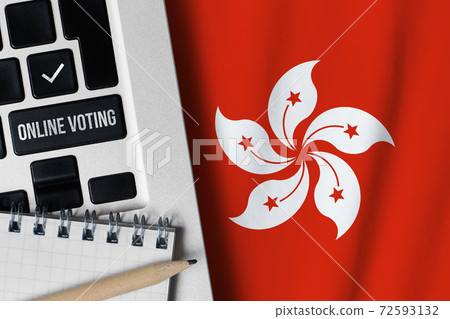 Online voting concept in Hong Kong. Keyboard near country flag. Online voting concept in Hong Kong. Keyboard near country flag. 72593132