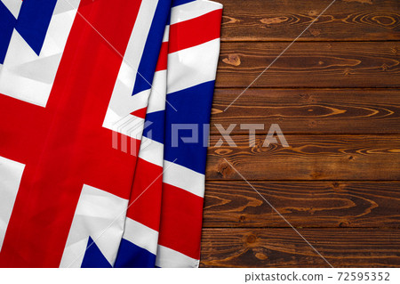 Flag of United Kingdom on wooden background 72595352