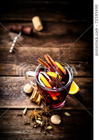 Mulled wine, hot warming drink with spices 72595498
