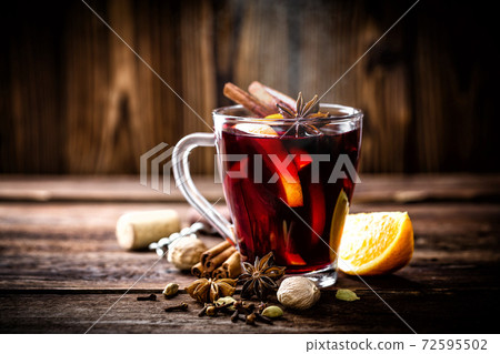 Mulled wine, hot warming drink with spices 72595502