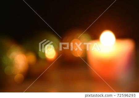 blurry golden ball couple candle light for decoration in Christmas and new year festival in black background blurry golden ball couple candle light for decoration in Christmas and new year festival in black background 72596293