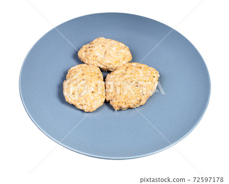 steamed red fish cutlets on blue plate isolated steamed red fish cutlets on blue plate isolated 72597178