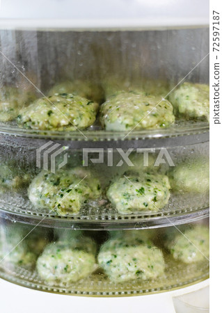 steamed cutlets from turkey meat and greens 72597187