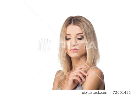 Beautiful woman demonstrates wellness, beauty concept Beautiful woman demonstrates wellness, beauty concept 72601435