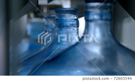 Close up drinking water filling machine. 72603544