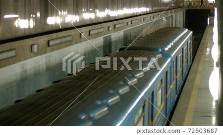 Subway train at station, top view. Subway train at station, top view. 72603687