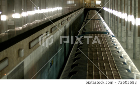 Metro train moving in tunnel, top view. Metro train moving in tunnel, top view. 72603688