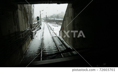 Passenger train going through tunnel. Passenger train going through tunnel. 72603701