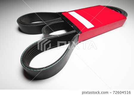 Wide poly-V bypass belt for internal combustion engine attachments in red carton. New spare alternator belt 72604516