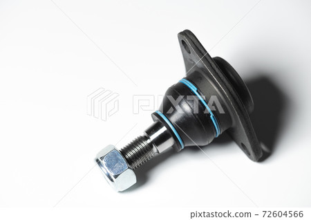 Ball joint car suspension on a gray background. New spare parts axel car elements Ball joint car suspension on a gray background. New spare parts axel car elements 72604566
