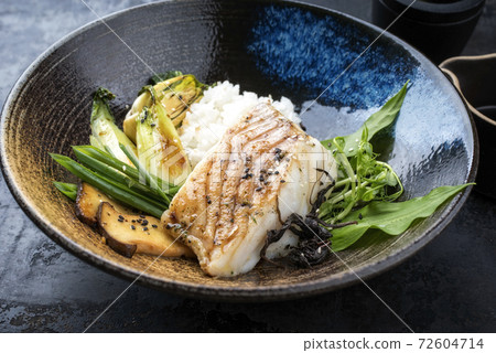 Modern style Japanese fried skrei cod fish filet with bok choi and rice Modern style Japanese fried skrei cod fish filet with bok choi and rice 72604714