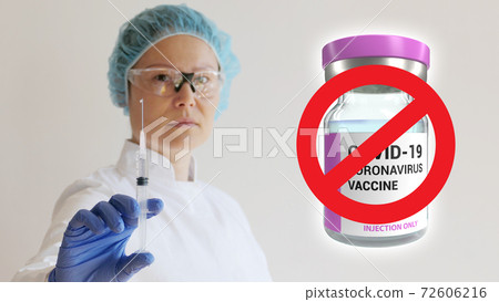 Nurse with injection in hand and coronavirus vaccine dose no vaccination Nurse with injection in hand and coronavirus vaccine dose no vaccination 72606216