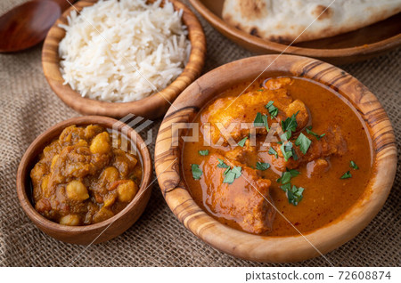 channa masala with butter chicken curry 72608874