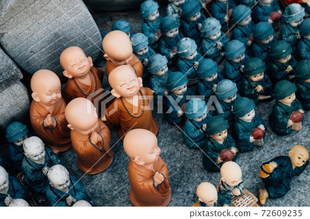 Cute buddha statue dolls at Huhuam temple in Yangyang, Korea Cute buddha statue dolls at Huhuam temple in Yangyang, Korea 72609235