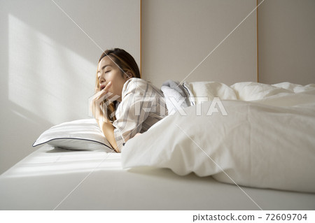 Waking up woman 72609704