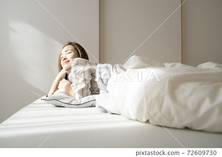 Waking up woman Waking up woman 72609730