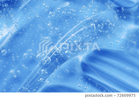 Blue gel smear swatch. Antibacterial sanitizer for hygiene sample. Jelly texture with collagen and bubbles. Cosmetic beauty skincare product texture. Skin care gel transparent smudge. Blue gel smear swatch. Antibacterial sanitizer for hygiene sample. Jelly texture with collagen and bubbles. Cosmetic beauty skincare product texture. Skin care gel transparent smudge. 72609975