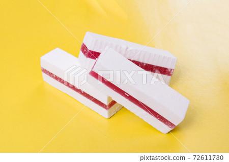 White cake with fruit jam close up White cake with fruit jam close up 72611780