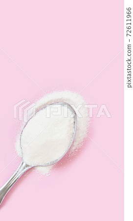 Collagen white powder. Pastel color background. Health product 72611966