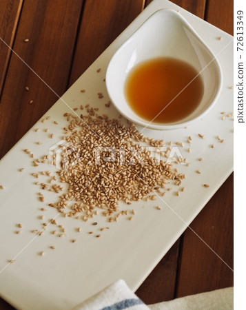 Sesame oil and sesame seeds, traditional Asian food 72613349