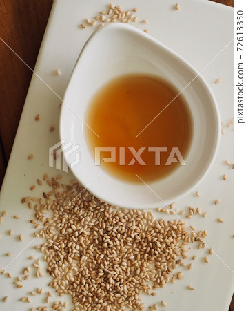 Sesame oil and sesame seeds, traditional Asian food 72613350