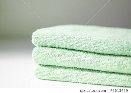 Folded and stacked towels 72613429