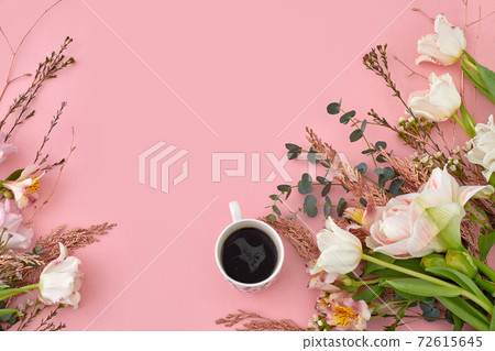 cup of coffee with pink tulip 72615645