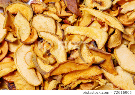 dried slices apples, group of dry slices of apple. Organic dried apple. background texture dried slices apples, group of dry slices of apple. Organic dried apple. background texture 72616905