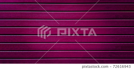 pink plastic fence striped texture background. By type of wood simulating the wooden surface of the siding 72616943