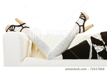 female legs in woolen stockings heeled shoes female legs in woolen stockings heeled shoes 72617668