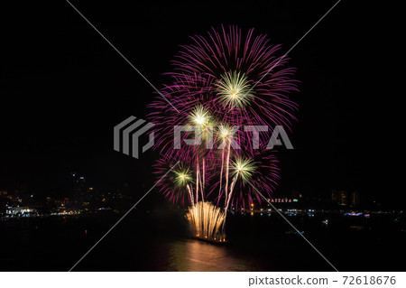 Colorful firework over Pattaya beach during International Festival, celebration for New Year Colorful firework over Pattaya beach during International Festival, celebration for New Year 72618676