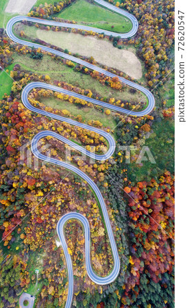 Road in autumn scenery - aerial shot 72620547