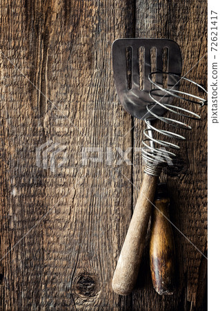 Culinary background. Kitchen utensils on a wooden table and space for recipe or menu 72621417