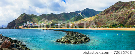 Impressive beach of volcanic Tenerife island- Las Teresitas with scenic San Andres village. Impressive beach of volcanic Tenerife island- Las Teresitas with scenic San Andres village. 72625768